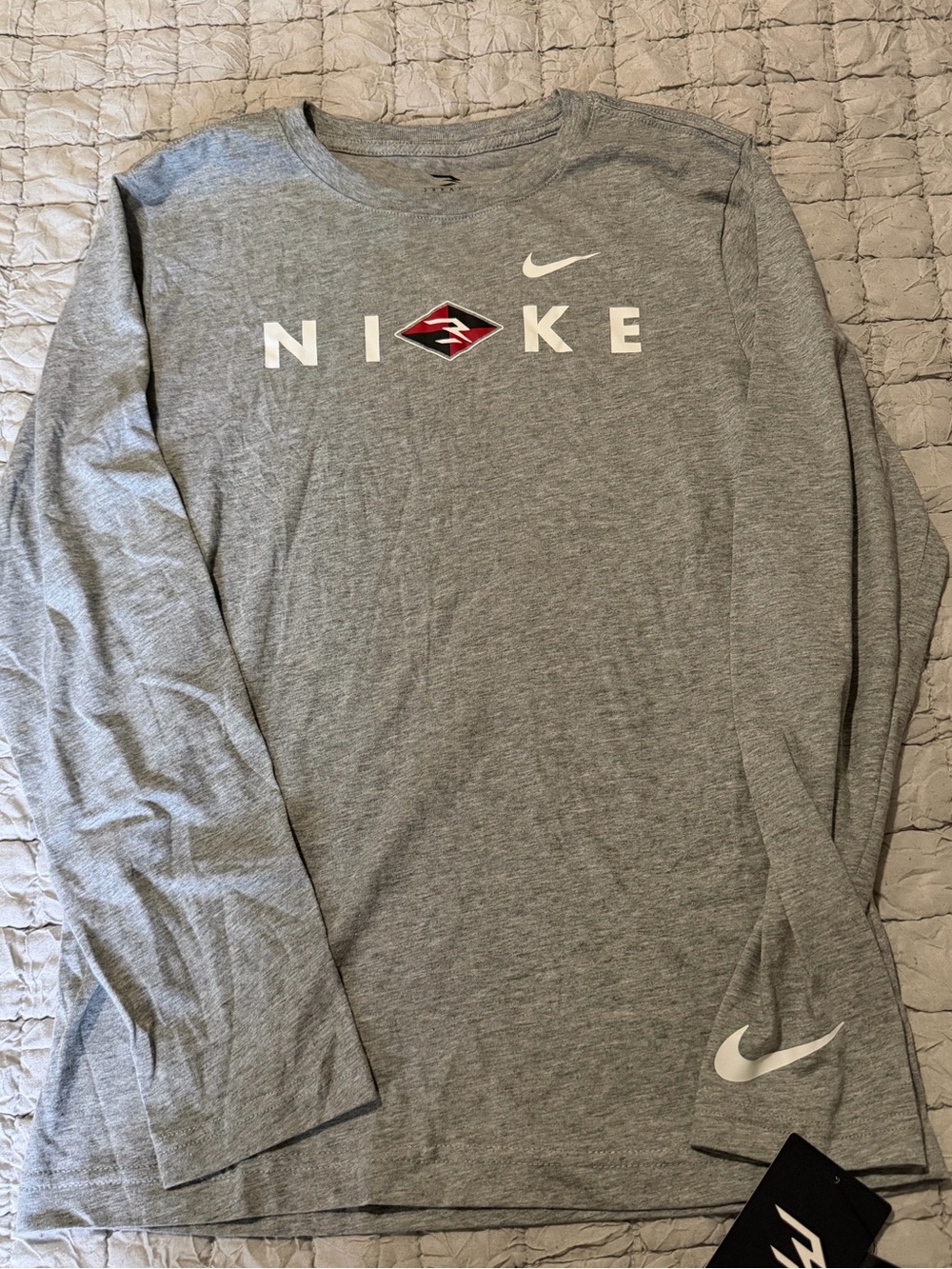 Nike Gray Long Sleeve Tee with White Swooshes and Red Accent